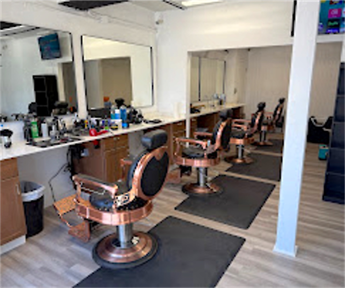 Barber chairs inside JR Barbershop